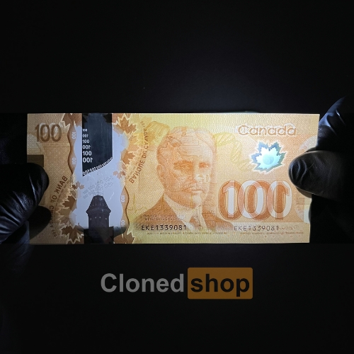 100 CAD back
